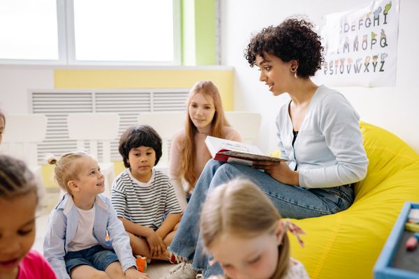 Teacher reading at TinySteps Preschool